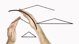Two hands aligning themselves with an abstract diagram of lines and shapes.