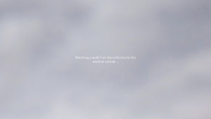 A blurred photo of the sky above the museum with white text in the center. It reads: Matching a work from the collection to the weather outside.